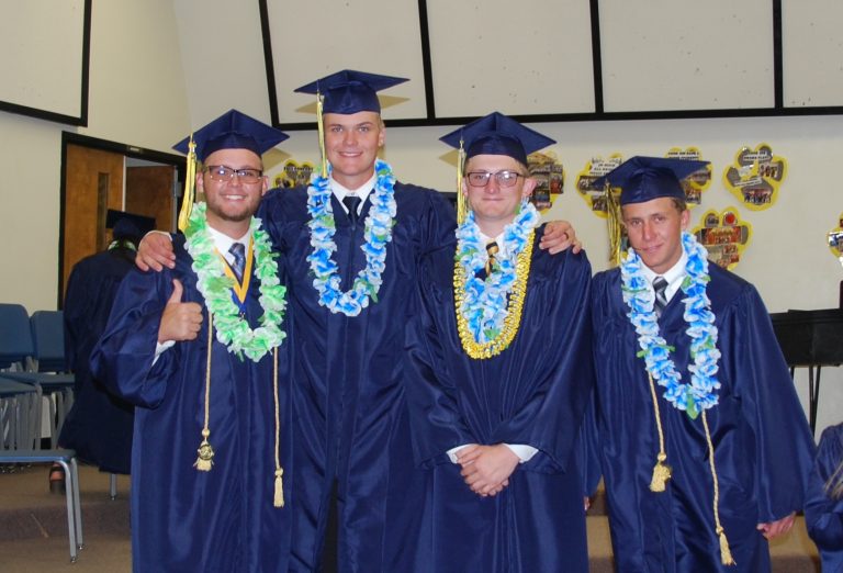 Photo by Linda KorJoseph City High School seniors (left to right) Avery Buckley, Jay Edwards, DJ Beatty and Colter Westover share a moment together backstage before graduation last Thursday.