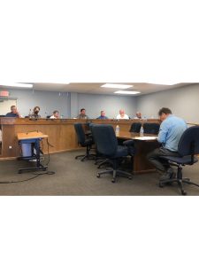 Photo by Linda KorThe Holbrook City Council met last week for a budget work session and a brief meeting. Pictured are (left to right) council members Kip Woolford and Adam Marsh, Vice Mayor Francie Payne, Mayor Merrill Young, council members Tim Dixon, Mike Nilsson and Earl Kester, and City Manager Ted Soltis.