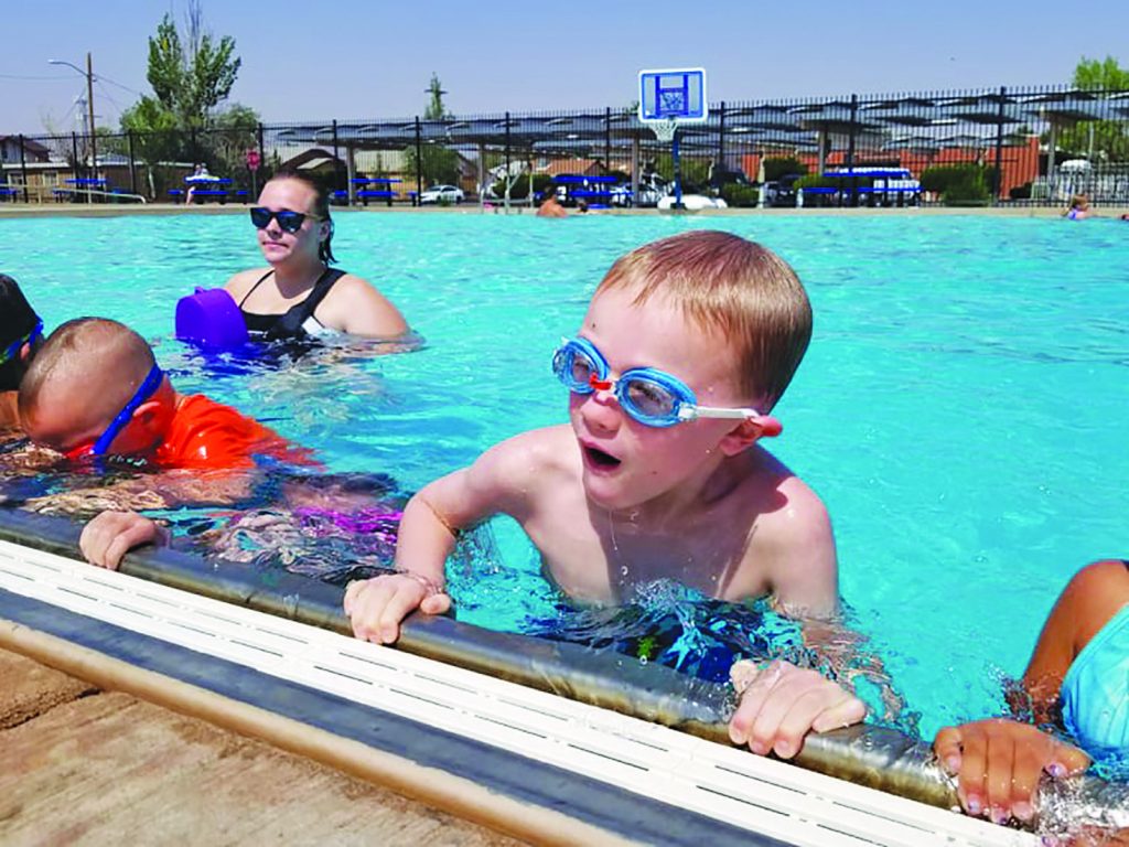 Photo by L. ParsonsHot days make cool water a great option for kids needing some exercise this summer. Here 6-year-old Five Greer (right) practices his skills during intermediate swimming lessons at the Winslow Public Pool last week while his instructor Luna Slattery (left) looks on.