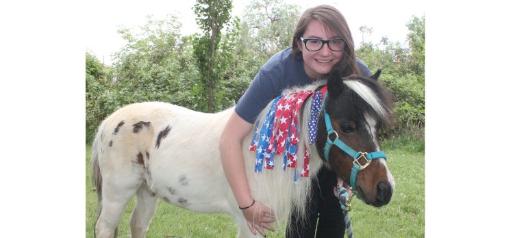 Photo by Linda KorRebecca Berge of Joseph City and her miniature horse Dandy are all set for their Independence Day celebration. The coming weekend has plenty of fun events and fireworks in both Holbrook and Winslow to take part in.