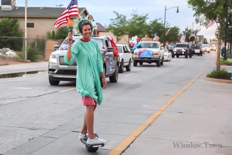 Photo by Lori LawAmy Hartnett donned her best Lady Liberty and rode the entire Fourth of July parade route on a one wheel board last week in Winslow.