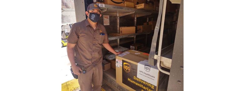 Photo courtesy of United Parcel ServiceUnited Parcel Service driver, Cody Rodriguez delivers valuable Sterling freezers that store the Pfizer vaccine to remote areas on the Navajo Nation.