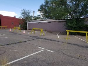 Photo by L. ParsonsThe roof of the former Desert Scene Lodge, located at 104 E. First St. collapsed on May 23 causing the loss of already minimal parking spaces downtown.