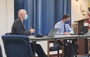 Photo by Annyssa HowertonNPC President Dr. Chato Hazelbaker (left) addressed the Navajo County Governing Board in the Aug. 17 meeting. Also pictured is Administrative Assistant John Hempsey (right).