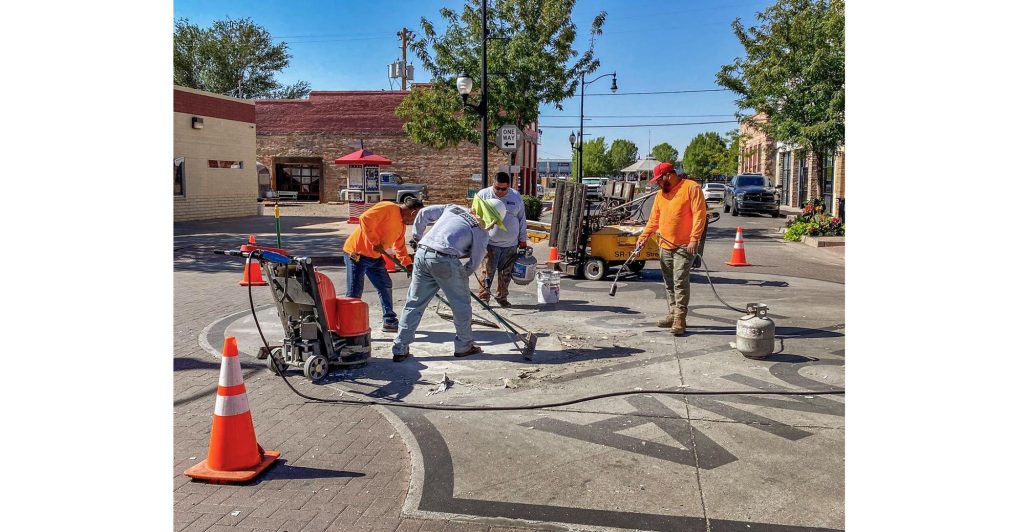 Photo by Jim BuckleyAn Arizona Department of Transportation (ADOT) crew performed a refurbish on the famous Route 66 sign at the intersection of Second Street and Kinsley Avenue in Winslow recently. The popular tourist stop was cleaned and repainted with a grant from the Historic Route 66 Association of Arizona just in time for the Standin’ on the Corner Festival later this month.