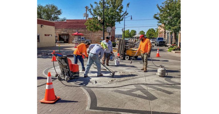 Photo by Jim BuckleyAn Arizona Department of Transportation (ADOT) crew performed a refurbish on the famous Route 66 sign at the intersection of Second Street and Kinsley Avenue in Winslow recently. The popular tourist stop was cleaned and repainted with a grant from the Historic Route 66 Association of Arizona just in time for the Standin’ on the Corner Festival later this month.