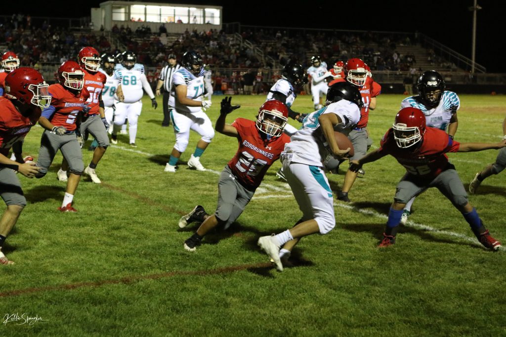 Photo by Kellie Spangler/Spanglerpics.comThe Roadrunners made it a tough night for the Pinon Eagles, with moves like this from the Roadrunner’s impressive defense.