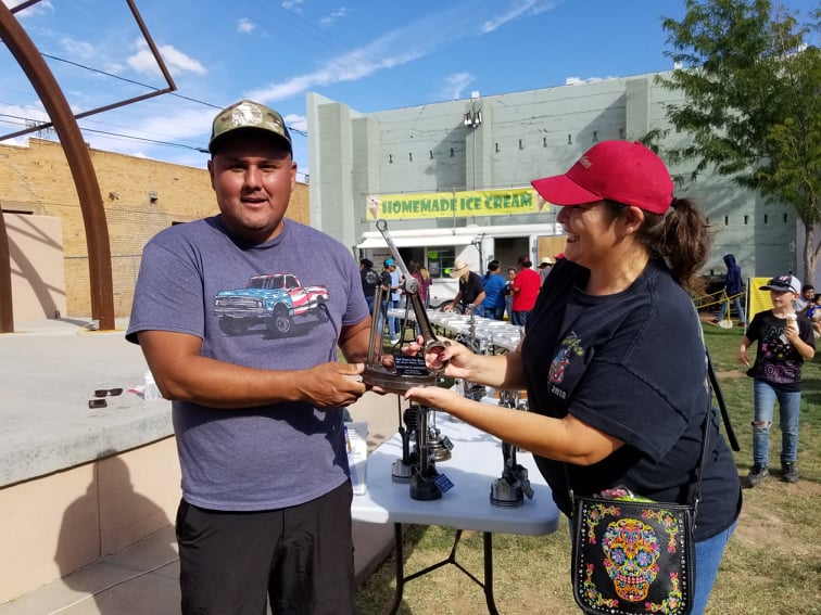 Photo by L. ParsonsTyrone Alcott (left) accepted the Mayor’s Choice award for his 1955 Chevrolet from Mayor Roberta Cano (right) at the Just Cruis’n Car Show in Winslow last week.