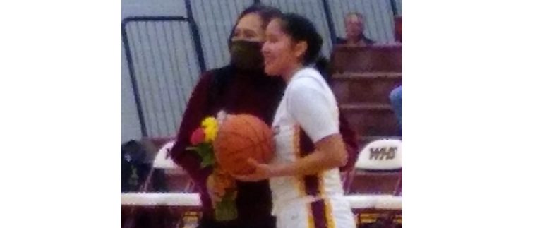 Photo by K. ConnerLady Bulldog Kylie Begay obtained membership in the Winslow High School 1000-Point Club last week. Here she’s pictured with WHS alumni Dr. Michelle Tom who is also a member of the club.