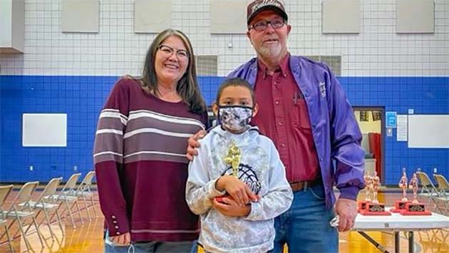 Photos by Gypsie GroverJerron Jordon (center) has advanced to the state Elks Hoop Shoot. Also pictured is Winslow Unified School District Superintendent Connie Grover (left) and Chuck Long (right) with the Winslow Elks.