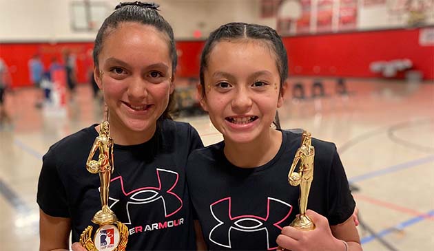 Photo courtesy of Holbrook Unified School DistrictSisters Payton Orton and Callie Orton are Elks Hoop Shoot State Champions! Callie attends Indian Wells Elementary School and won in the 8-9-year-old division and Payton attends Holbrook Junior High School in the 12-13-year-old division. Both girls will represent Arizona at the western region hoop shoot contest in Las Vegas on Feb. 26. They are the daughters of Holbrook Unified School District teachers Dan and Roni Orton.