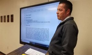 Photo by L. ParsonsWinslow High School Principal Sal Hernandez addresses the Winslow Unified District Governing Board on student academic growth.