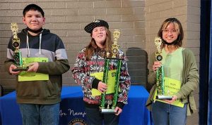 Photo courtesy of the Navajo County Superintendent of SchoolsThe Navajo County Spelling Bee was held Feb. 16 at the Snowflake High School auditorium. With 20 spellers ready to go, and after an hour of competition it came down to the final round with the winning word of “deserter.” The champion is Snowflake Junior High School seventh grader Gia Goaziou (center), runner-up is Blue Ridge Junior High School eighth grader Rain Dimaliwat (right) and third place went to Winslow Junior High School seventh grader Aayden Roland (left). Goaziou will represent Navajo County in the State Spelling Bee to be held March 19 in Phoenix.