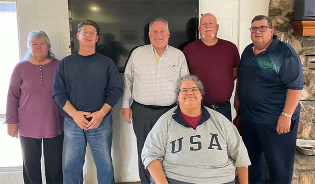 Photo courtesy of the Holbrook Emergency Food BankThe new board of the Holbrook Emergency Food Bank include (left to right) Darcel Minter, Pete Roach, President Mike Nilsson, Secretary Lisa Salazar (seated), Delton Jenkins, Brent Turley, (not pictured) Treasurer Francie Payne, Christine Nilsson, Shannon Lange and Carla Gabaldon. The Holbrook Emergency Food Bank is open 12 to 2 p.m., Monday through Friday and is located at 217 Joy Nevin Ave. The food bank may supply up to four boxes of food per year to people in the Holbrook area based on need. This is a volunteer staff, with donations to go towards the purchase of food for those in need.