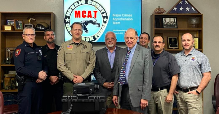 Photo courtesy of Navajo County Sheriff’s OfficeNavajo County law enforcement will now be able to utilize a Mx908 multi-mission handheld spectrometer that identifies dangerous and narcotic drugs. Pictured are (left to right) Holbrook Police Chief Nathan Christensen, Winslow Police Chief Ken Arend, Navajo County Sheriff David Clouse, HIDTA Deputy Director Brett Cline, Navajo County Attorney Brad Carlyon, Pinetop-Lakeside Police Chief Dan Barnes, Show Low Police Chief Brad Provost and Snowflake Taylor Police Chief Bobby Martin.
