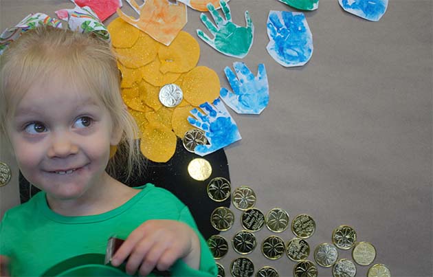 Photo by L. ParsonsRemington Nelson celebrates not only St. Patrick’s Day tomorrow but her third birthday as well. Here she is in front of the holiday decorations at her daycare, Imagination Station in Winslow.