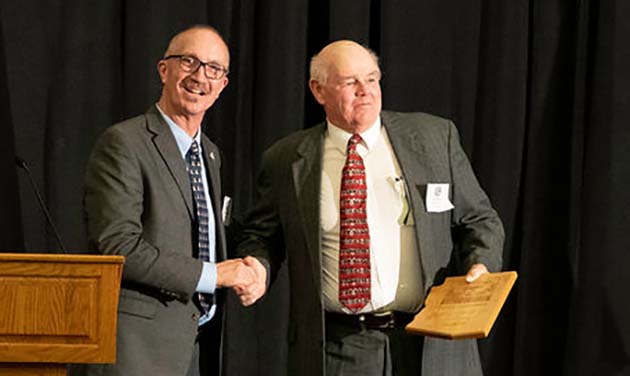 Photo courtesy of the Ranching Hall of FameThe Jeffers family was honored for its generational contribution to the ranching community of northern Arizona. Bill Jeffers (right) accepted the award on behalf of his family at the Ranching Hall of Fame banquet.