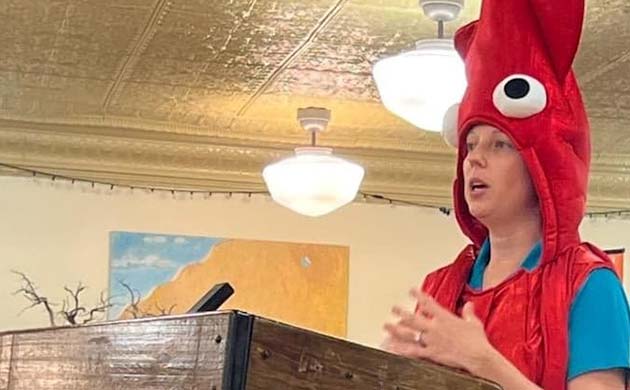 Photo by Melissa NelsonWinslow City Librarian Brandee Leary is often dressed in costume as it pertains to activities at the library. Here, she addresses the Winslow City Council as a squid to announce the Summer Reading Program, Oceans of Possibilities which begins June 1.