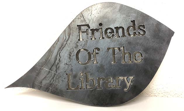 Photo courtesy of the Winslow Public LibraryThe Winslow Friends of the Library are currently selling metal leaves to place on their Reading Tree as a fundraiser to help build a new library.