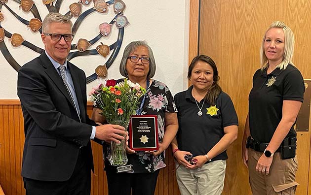 Photo courtesy of Navajo CountyBonita Chase (second from left) retired after 21 years at Navajo County. Also pictured are (left to right) County Manager Glenn Kephart, and probation officers Winifred Lincoln and Ashton LeSueur.