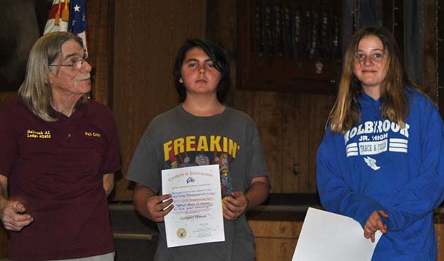 Photos courtesy of Holbrook Elks LodgeElks Essay Contest winners included Holbrook High School students Gregory Queen (center) and Kendrick Taylor (right), pictured with Elks Exalted Ruler Phil Cobb (left).