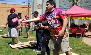 Photo by L. ParsonsPaul Mazon was one of many that took part in an all-day long corn hole tournament held last weekend at Root 66 Plaza in Winslow. The tournament was part of the Jammin' for Jackson event, a fundraiser for the Juvenile Diabetes Research Fund (JDRF) hosted by Winslow City Councilwoman Melissa Nelson whose son Jackson has juvenile diabetes. The fundraiser also featured three bands, food vendors and a live auction. Hundreds attended and over $3,000 was raised.