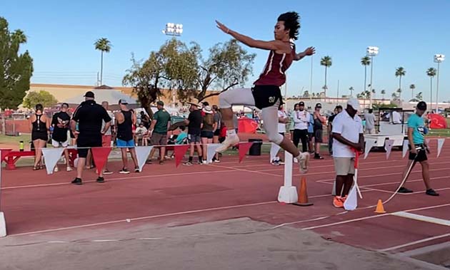 Photo by Jack JueWinslow High School senior Jett Jue completed his undefeated season with a State Championship title in Long Jump last week. Jue bested himself by 6-inches in his final 23’6” jump, which also happened to be 8” longer than his closest competitor.