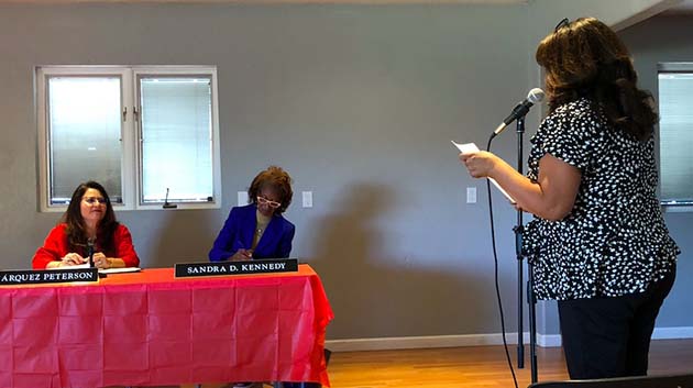 Holbrook Chamber of Commerce Director Cindy Tafoya (right) addressed Arizona Corporation commissioners Lea Marquez Peterson and Sandra D. Kennedy at a town hall hosted last week.