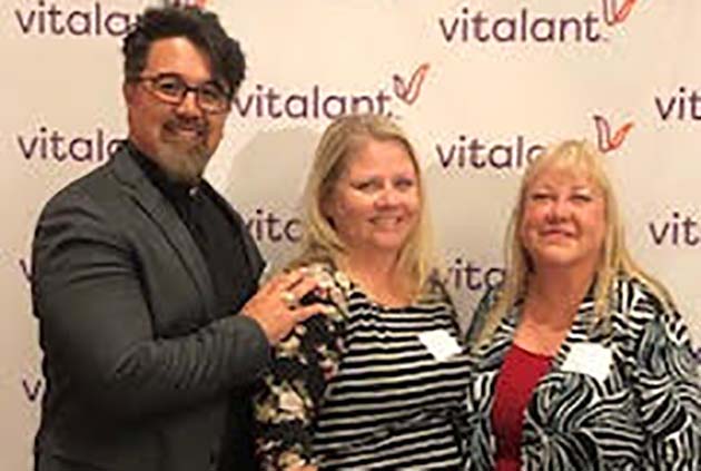 Photo courtesy of Nicole YoungHolbrook resident Nicole Young was awarded her second Impact Award by Vitalent for her work in hosting blood drives in her community. Pictured (left to right) is Vitalant Southwest Division Vice President Tom Choi, Nicole Young and Vitalant Senior Account Manager Carina Fors.