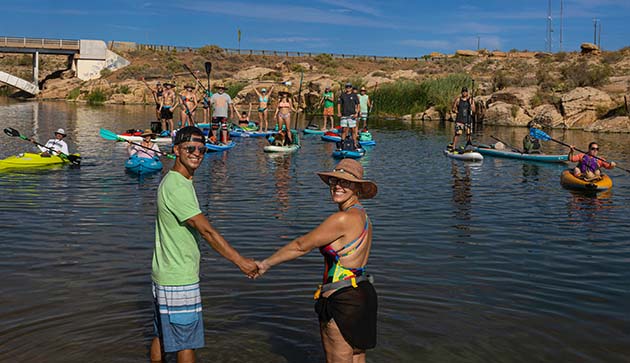 Photo by Richard LarsonEdgar and Monique Millian (center), leaders of the Arizona Adventure Group, headed up Clear Creek last Sunday with about 40 participants from the Phoenix area. Edgar jumped off the 99 bridge to start the adventure, which was a two-day event in Winslow.