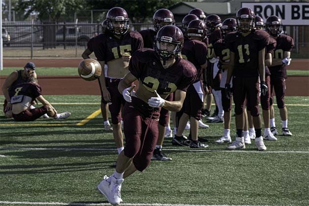 Photo by Richard LarsonWinslow High School football is in the air. Here Bulldogs practice ahead of the first home game and the Holbrook Roadrunners on Sept. 2.