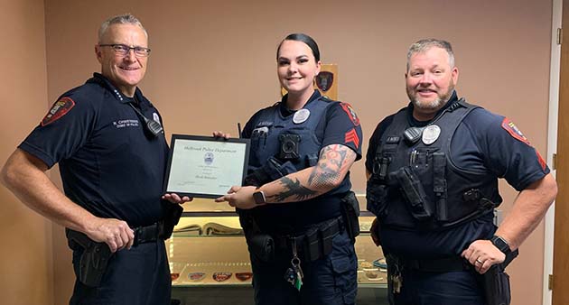 Photo courtesy of Holbrook Police DepartmentHolbrook Police Officer Heidi Hunsaker (center) has been promoted to sergeant and is pictured here being congratulated by Chief Nathan Christensen (left) and Sgt. Ray Patterson.
