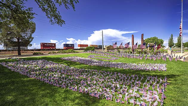 Photo by Richard Larson Last Sunday the City of Winslow honored those who lost their lives during the 9/11 terrorist attack in New York City, Washington, D.C., and Pennsylvania. The flags placed at the memorial represent nearly 3,000 lives and at the center of the memorial are portions of two steel girders from the Twin Towers. A ceremony was also held on Sunday.