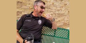 Photo by L. ParsonsWilling to take a ribbing for the stereotype Winslow Police Chief Ken Arend couldn’t resist partaking in the tasty donuts that were sold at the Standin’ on the Corner Park last week by a visiting out of town vendor.