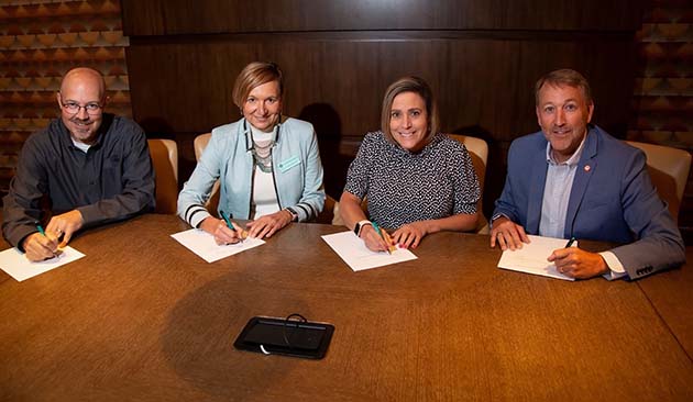 Photo courtesy of Northland Pioneer CollegeCollege presidents (left to right) Northland Pioneer College President Dr. Chato Hazelbaker, Coconino Community College Interim President Dr. Christal M. Albrecht, Yavapai College President Dr. Lisa Rhine, and Mohave Community College President Dr. Stacy Klippenstein signed a historic partnership agreement to share resources that will benefit students and residents throughout northern Arizona.