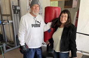 Holbrook resident Danny Duran (left) and his wife Marylou (right) opened the Eye of the Tiger Gym in Holbrook to encourage other seniors to exercise and to encourage a love of boxing.