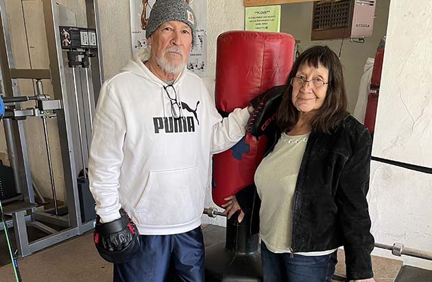 Holbrook resident Danny Duran (left) and his wife Marylou (right) opened the Eye of the Tiger Gym in Holbrook to encourage other seniors to exercise and to encourage a love of boxing.