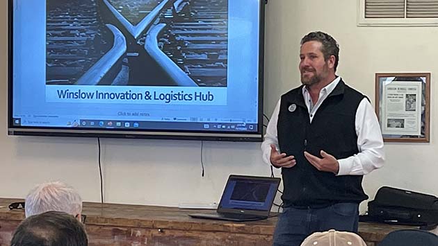 Daniel Lupien (pictured) one of the partners in Atlas Global Development Group explains to those at a public meeting the development he hopes to bring to Winslow that will provide industry and homes.