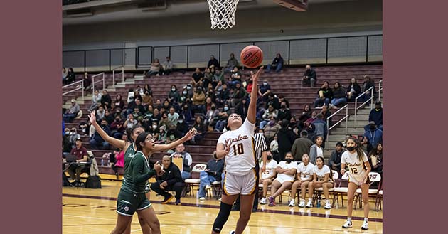 Photo by Richard LarsonThe Lady Bulldogs dominated the Tuba City Warriors last week with a final score of 43-35. Here No. 10 Jaci Gonnie takes the shot with little resistance from the Warrior players.