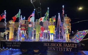 Holbrook Family Dental won Best Overall with its Nutcrackers Around the World float in last Saturday’s Parade of Lights. The holiday cheer could not be dampened even with the light rainfall as 27 entries made their way through the streets of downtown Holbrook.