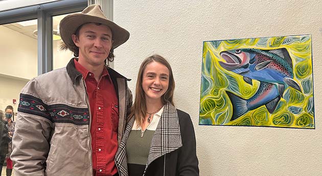 Photo courtesy of Northland Pioneer CollegeThe talent of artists from throughout Navajo and Apache counties was evident in this fall’s Locally Grown juried art exhibition at the Talon Gallery at Northland Pioneer College. Emma Rockey (right) of Snowflake took home the second place cash award with her painting A Trout for Russell. Residents James Beck Gucwa of Pinetop and Karen Lewis of Show Low captured first and third place cash awards.