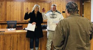 Photo courtesy of Joseph City Unified School DistrictJoseph City Unified School District Governing Board President Eldon Larsen (right) conducted the swearing in of two members to the board during the board’s meeting last week. Cat Hansen (left) was sworn in as a new member and Dayton Flake (center) was sworn in as a continuing member.