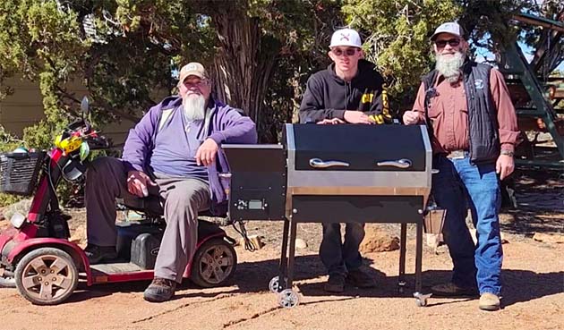 Photo courtesy of the Silver Creek FFA Alumni & SupportersRon Braun (left), Michael Skinner, the Snowflake FFA Greenhand Sentinel (center) and Jack Babb, the Silver Creek FFA Alumni & Supporters President (right) show off the Recteq grill awarded to Braun following a state-wide fundraiser sponsored by the Arizona Agricultural Education/FFA Foundation.