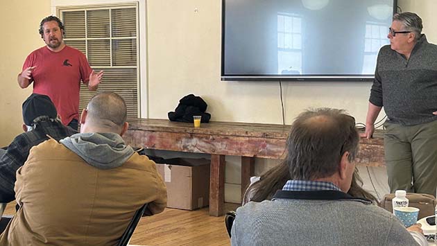 Photo by Shawn WhiteDan Lupien (left) from Atlas Global Development presented to Winslow business owners about his manufacturing and logistics plan for Winslow. Also pictured is Chamber CEO Bob Hall (right).