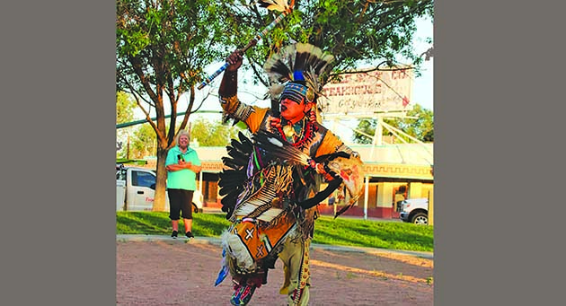 Photo by John JimenezThe Native American dancers that are part of Holbrook Summer Dance Groups share their culture through their talent and the regalia they wear as they perform traditional dances as shown here with Traditional Dancer Calvert Dixon. This experience is not one to miss and may be viewed from 6:30 to 8:30 p.m., Monday through Thursday until at least July 20, at Gillespie Park.