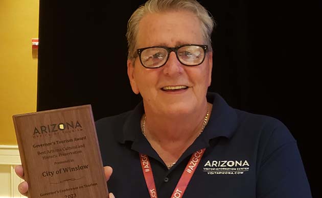 Photo courtesy of the Winslow Chamber of CommerceLast week Winslow Chamber of Commerce CEO Bob Hall (pictured) accepted on behalf of the Winslow Historic Preservation Commission, an award presented to the City of Winslow from the Arizona Office of Tourism at the Governor's Conference in Tucson for Best Cultural & Historic Preservation.