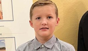 Photo courtesy of The Ferraro GroupCallum Richards of Winslow is shown here with his photo as displayed at the Arizona Capitol Museum.