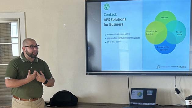 Photo by Shawn WhiteEdgar Olivo (left) presenting in front of the business community at the Winslow Chamber of Commerce’s monthly Good Morning Winslow meeting.