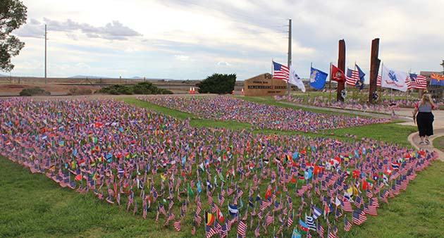 Photo by Shawn WhiteAt the Winslow 9/11 Memorial on Sept. 11, 2,973 American flags were on display to represent the lives lost in the 2001 tragedy, alongside flags from the 161 nations who all lost people. The flags were presented in the shape of the Twin Towers, with a tribute to the Stonycreek Township plane crash in Pennsylvania. The memorial also honors first responders who died due to illnesses received as a result of responding to the disaster and stands as a symbol of unity and resilience. This display was orchestrated by Ken Evans and a team of volunteers.