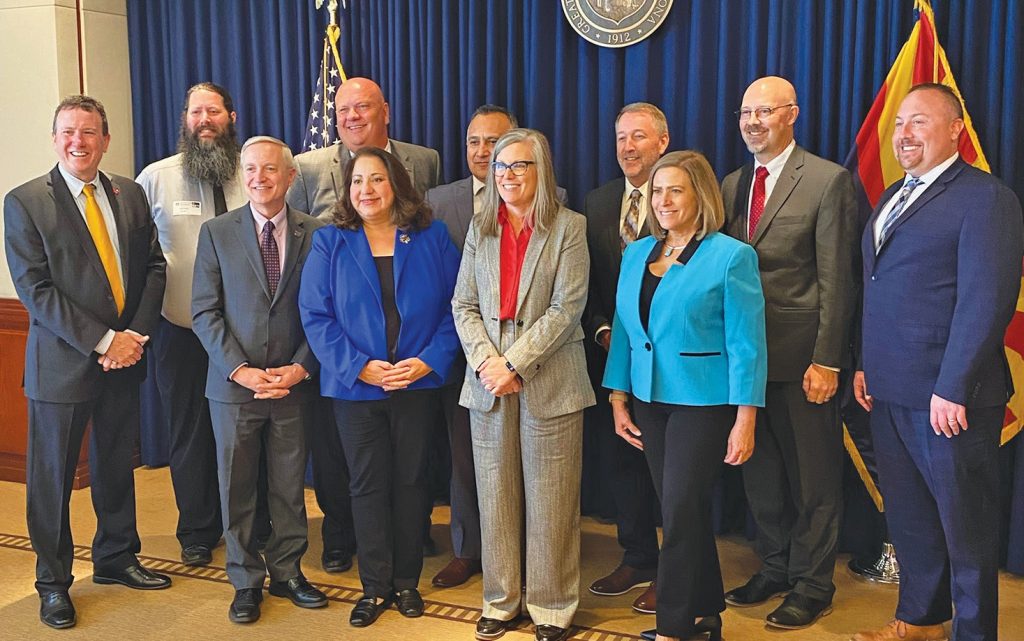 Community college leaders met with Governor Katie Hobbs. Pictured are (front row, left to right) Todd Haynie, Eastern Arizona College; Dolores Duran-Cerda, Pima Community College; Katie Hobbs, Governor; Lisa Rhine, Yavapai College, (back row) Daniel Corr, Arizona Western College; Andrew Clegg, Central Arizona College; JD Rottweiler, Cochise College; Steven Gonzales, Maricopa Community Colleges; Stacy Klippenstein, Mohave Community College; Chato Hazelbaker, Northland Pioneer College; and Eric Heiser, Coconino Community College. Photo courtesy of Northland Pioneer College